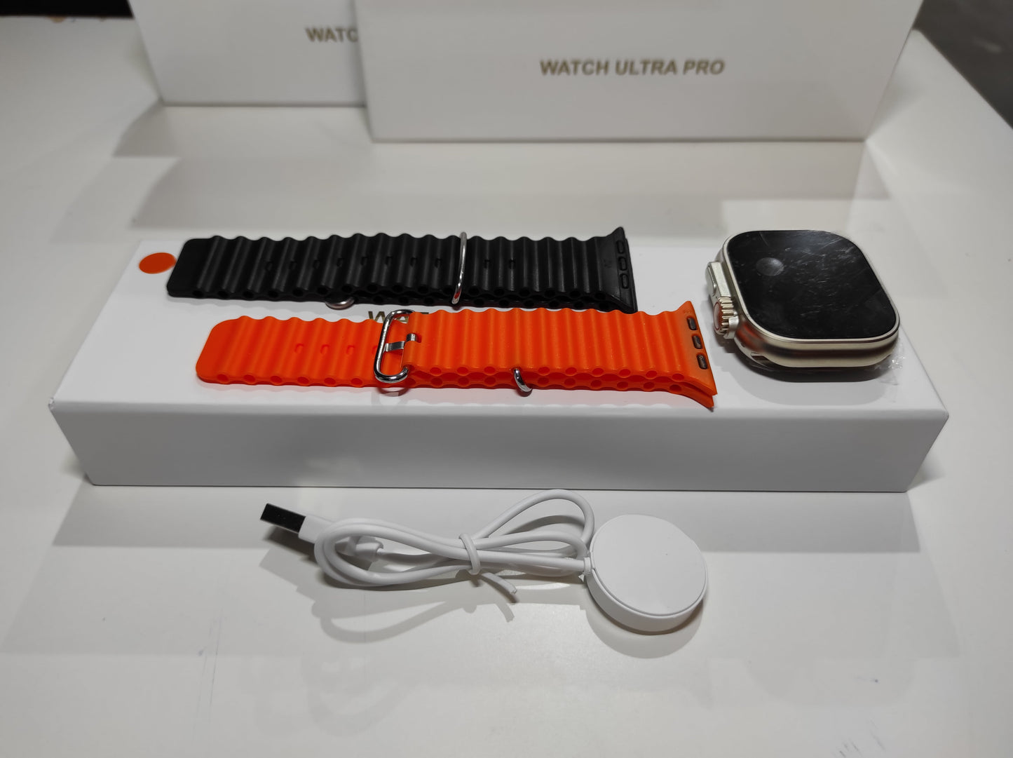 A- Smartwatch Ultra Pro con 2 correas